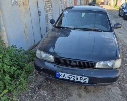 Серый Киа Кларус, объемом двигателя 2 л и пробегом 300 тыс. км за 895 $, фото 1 на Automoto.ua