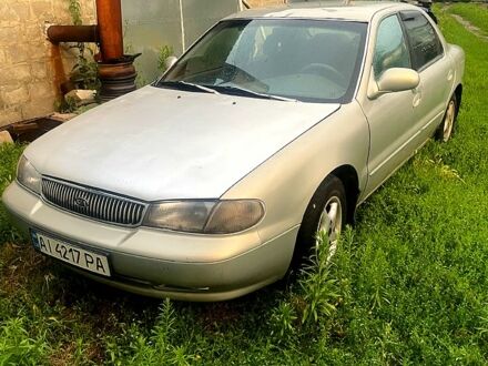 Сірий Кіа Кларус, об'ємом двигуна 2 л та пробігом 333 тис. км за 1700 $, фото 1 на Automoto.ua