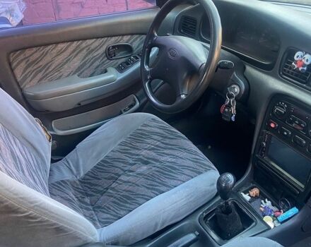 Сірий Кіа Кларус, об'ємом двигуна 2 л та пробігом 169 тис. км за 701 $, фото 1 на Automoto.ua
