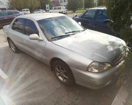 Серый Киа Кларус, объемом двигателя 2 л и пробегом 380 тыс. км за 1800 $, фото 1 на Automoto.ua