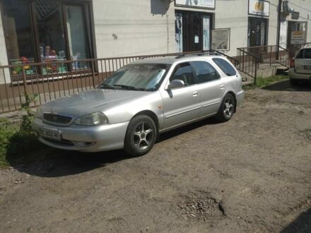 Серый Киа Кларус, объемом двигателя 1.8 л и пробегом 250 тыс. км за 1298 $, фото 1 на Automoto.ua