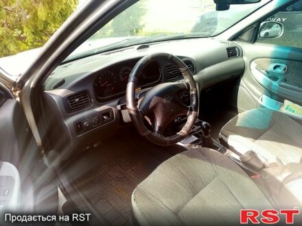 Сірий Кіа Кларус, об'ємом двигуна 2 л та пробігом 360 тис. км за 1500 $, фото 1 на Automoto.ua