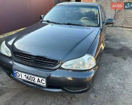 Сірий Кіа Кларус, об'ємом двигуна 2 л та пробігом 413 тис. км за 1750 $, фото 1 на Automoto.ua