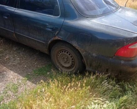 Сірий Кіа Кларус, об'ємом двигуна 2 л та пробігом 300 тис. км за 800 $, фото 1 на Automoto.ua