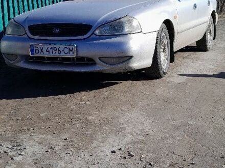 Серый Киа Кларус, объемом двигателя 2 л и пробегом 300 тыс. км за 1800 $, фото 1 на Automoto.ua