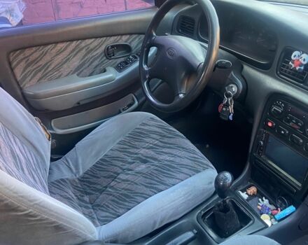 Сірий Кіа Кларус, об'ємом двигуна 2 л та пробігом 169 тис. км за 701 $, фото 1 на Automoto.ua