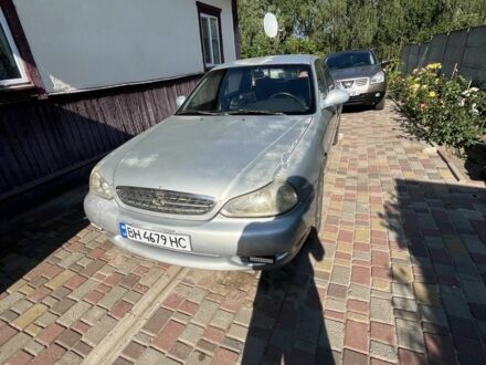 Сірий Кіа Кларус, об'ємом двигуна 2 л та пробігом 150 тис. км за 1445 $, фото 1 на Automoto.ua