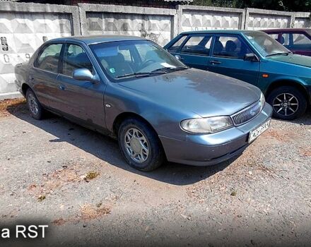 Серый Киа Кларус, объемом двигателя 2 л и пробегом 296 тыс. км за 1100 $, фото 1 на Automoto.ua