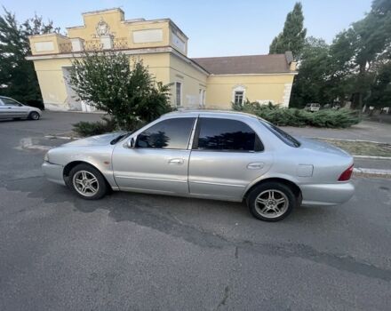 Сірий Кіа Кларус, об'ємом двигуна 2 л та пробігом 325 тис. км за 1254 $, фото 1 на Automoto.ua
