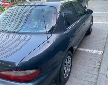Синий Киа Кларус, объемом двигателя 2 л и пробегом 360 тыс. км за 1100 $, фото 3 на Automoto.ua