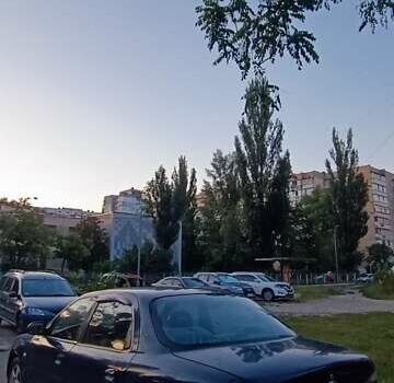 Синий Киа Кларус, объемом двигателя 1.8 л и пробегом 311 тыс. км за 1150 $, фото 4 на Automoto.ua
