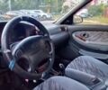 Синий Киа Кларус, объемом двигателя 1.8 л и пробегом 311 тыс. км за 1150 $, фото 7 на Automoto.ua