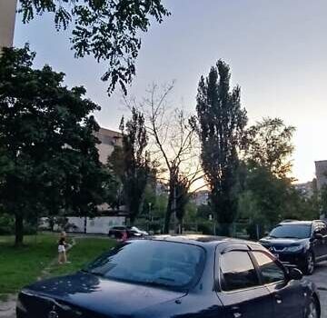 Синий Киа Кларус, объемом двигателя 1.8 л и пробегом 311 тыс. км за 1150 $, фото 3 на Automoto.ua