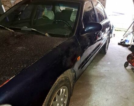 Синій Кіа Кларус, об'ємом двигуна 2 л та пробігом 270 тис. км за 2500 $, фото 2 на Automoto.ua