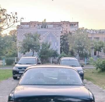 Синий Киа Кларус, объемом двигателя 1.8 л и пробегом 311 тыс. км за 999 $, фото 2 на Automoto.ua