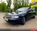 Синий Киа Кларус, объемом двигателя 2 л и пробегом 252 тыс. км за 1999 $, фото 1 на Automoto.ua