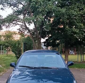 Синий Киа Кларус, объемом двигателя 1.8 л и пробегом 311 тыс. км за 999 $, фото 5 на Automoto.ua