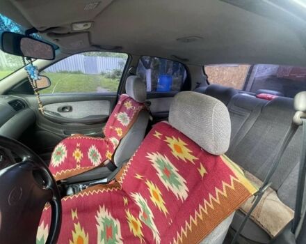 Синій Кіа Кларус, об'ємом двигуна 2 л та пробігом 301 тис. км за 1650 $, фото 5 на Automoto.ua