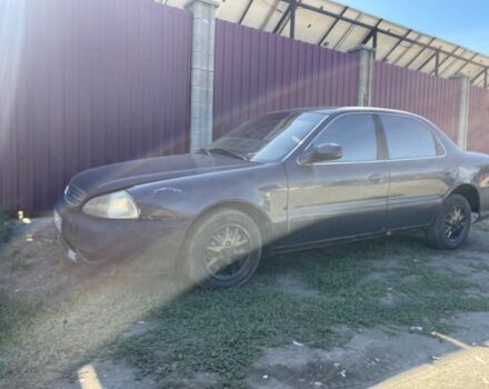 Синий Киа Кларус, объемом двигателя 2 л и пробегом 300 тыс. км за 950 $, фото 2 на Automoto.ua