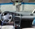 Синій Кіа Кларус, об'ємом двигуна 2 л та пробігом 256 тис. км за 951 $, фото 6 на Automoto.ua