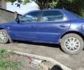 Синій Кіа Кларус, об'ємом двигуна 2 л та пробігом 256 тис. км за 951 $, фото 2 на Automoto.ua