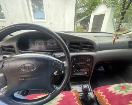 Синій Кіа Кларус, об'ємом двигуна 2 л та пробігом 301 тис. км за 1650 $, фото 6 на Automoto.ua