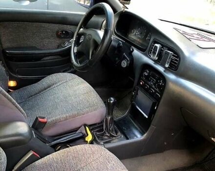 Синий Киа Кларус, объемом двигателя 2 л и пробегом 207 тыс. км за 1500 $, фото 2 на Automoto.ua