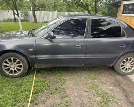 Синій Кіа Кларус, об'ємом двигуна 2 л та пробігом 301 тис. км за 1650 $, фото 3 на Automoto.ua