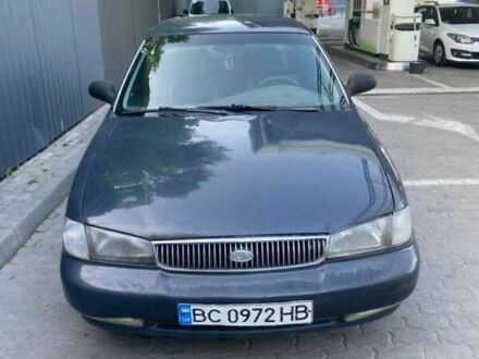 Синий Киа Кларус, объемом двигателя 2 л и пробегом 395 тыс. км за 2200 $, фото 1 на Automoto.ua