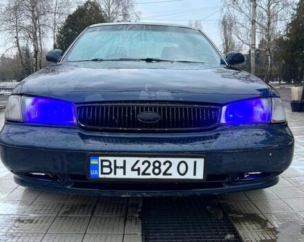 Синий Киа Кларус, объемом двигателя 2 л и пробегом 400 тыс. км за 1500 $, фото 1 на Automoto.ua