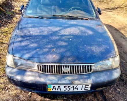 Синий Киа Кларус, объемом двигателя 2 л и пробегом 200 тыс. км за 850 $, фото 1 на Automoto.ua