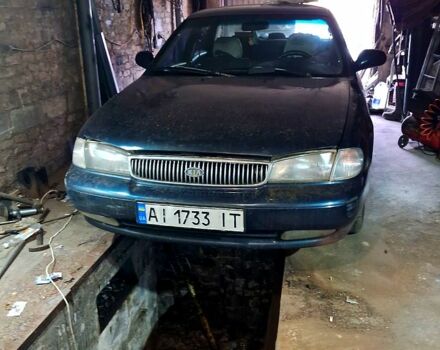 Синій Кіа Кларус, об'ємом двигуна 2 л та пробігом 270 тис. км за 2500 $, фото 1 на Automoto.ua