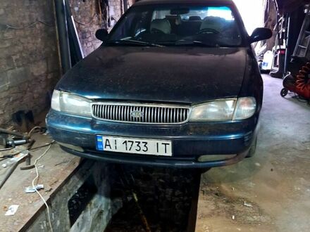 Синий Киа Кларус, объемом двигателя 2 л и пробегом 270 тыс. км за 2500 $, фото 1 на Automoto.ua