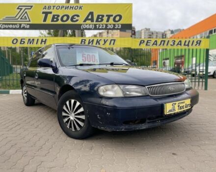 Синий Киа Кларус, объемом двигателя 2 л и пробегом 252 тыс. км за 1999 $, фото 1 на Automoto.ua