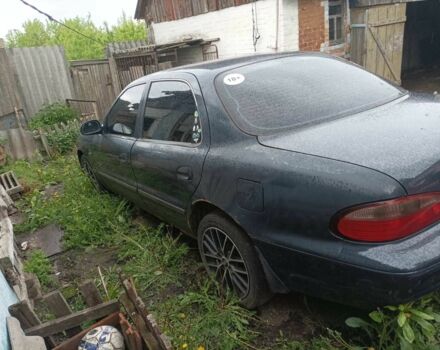 Синий Киа Кларус, объемом двигателя 2 л и пробегом 320 тыс. км за 900 $, фото 1 на Automoto.ua