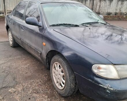 Синий Киа Кларус, объемом двигателя 2 л и пробегом 243 тыс. км за 1383 $, фото 1 на Automoto.ua