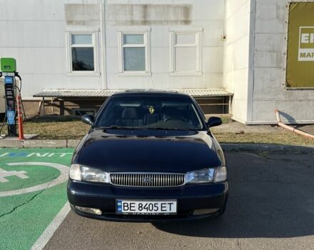 Синий Киа Кларус, объемом двигателя 2 л и пробегом 285 тыс. км за 2200 $, фото 1 на Automoto.ua