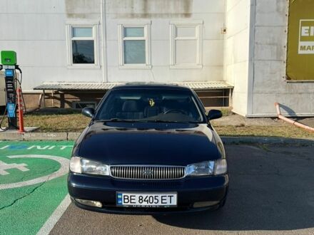 Синий Киа Кларус, объемом двигателя 2 л и пробегом 285 тыс. км за 2100 $, фото 1 на Automoto.ua