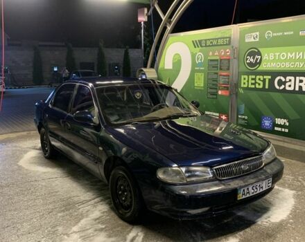 Синий Киа Кларус, объемом двигателя 2 л и пробегом 100 тыс. км за 1499 $, фото 1 на Automoto.ua