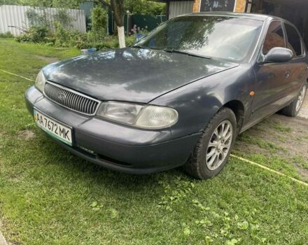 Синій Кіа Кларус, об'ємом двигуна 2 л та пробігом 301 тис. км за 1650 $, фото 1 на Automoto.ua