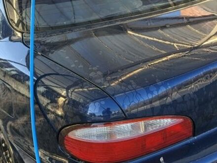 Синий Киа Кларус, объемом двигателя 2 л и пробегом 256 тыс. км за 1799 $, фото 1 на Automoto.ua