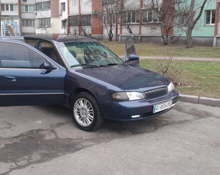Синий Киа Кларус, объемом двигателя 2 л и пробегом 400 тыс. км за 2000 $, фото 1 на Automoto.ua
