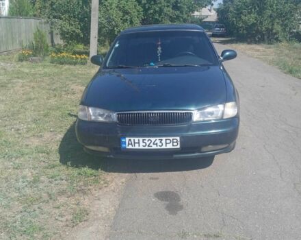 Зелений Кіа Кларус, об'ємом двигуна 2 л та пробігом 330 тис. км за 1862 $, фото 2 на Automoto.ua