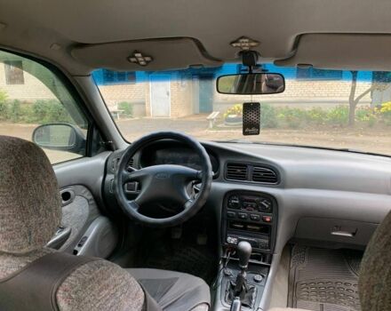 Зеленый Киа Кларус, объемом двигателя 2 л и пробегом 300 тыс. км за 1668 $, фото 8 на Automoto.ua