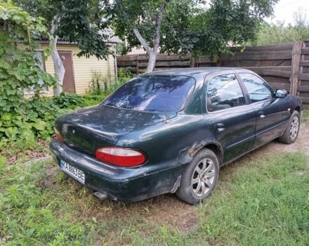 Зелений Кіа Кларус, об'ємом двигуна 2 л та пробігом 323 тис. км за 1000 $, фото 4 на Automoto.ua