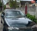 Зелений Кіа Кларус, об'ємом двигуна 2 л та пробігом 200 тис. км за 2000 $, фото 1 на Automoto.ua