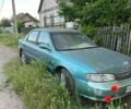 Зеленый Киа Кларус, объемом двигателя 2 л и пробегом 241 тыс. км за 700 $, фото 1 на Automoto.ua
