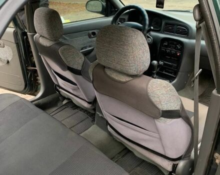 Зеленый Киа Кларус, объемом двигателя 2 л и пробегом 300 тыс. км за 1668 $, фото 3 на Automoto.ua