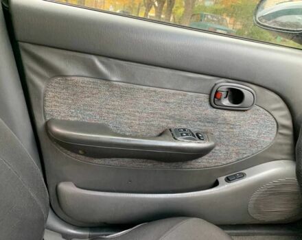 Зеленый Киа Кларус, объемом двигателя 2 л и пробегом 300 тыс. км за 1668 $, фото 4 на Automoto.ua