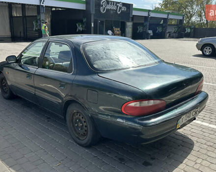 Зеленый Киа Кларус, объемом двигателя 2 л и пробегом 350 тыс. км за 1999 $, фото 3 на Automoto.ua